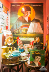 Amelie inspired photoshoot Amelie costume Montmartre Paris France travel Cafe des deux moulins Rue lepic trinkets souvenirs pig lamp